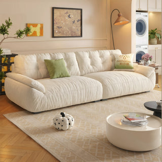 Cream chenille cloud sofa in a living room