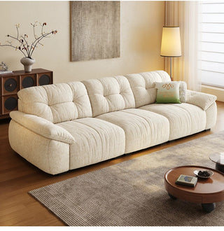 Plump tufted fabric sofa