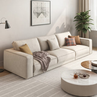 Cream fabric sofa in a living room