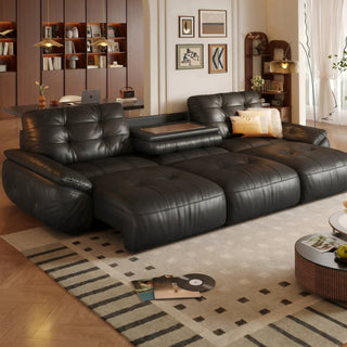 Black leather power sofa bed in a living room