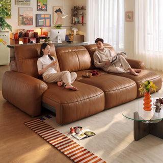 Tan leather power sofa in a living room