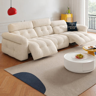 Cream chenille power recliner sofa in a living room