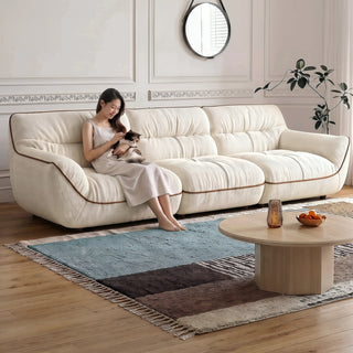 Cream fabric sofa in a living room