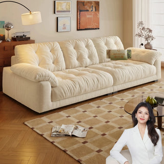 Cream chenille cloud sofa in a living room