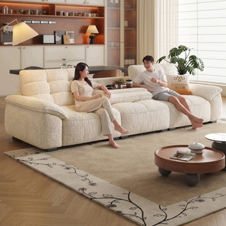 Cream waffle-tufted sofa with flip-down table in a living room