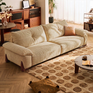 Cream fabric sofa in a living room