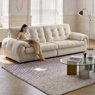 Cream cotton-linen sofa in a living room