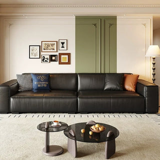 Black leather block sofa in a living room