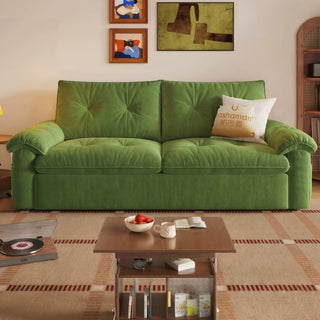 Olive-green cat-scratch sofa in a living room