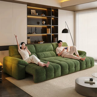 Green chenille power sofa bed in a living room