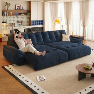 Navy ripple-chenille power sofa bed in a living room