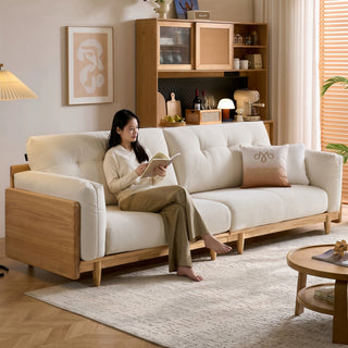 Cream chenille sofa with rubberwood frame in a living room