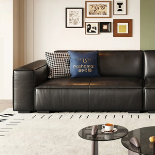 Black leather block sofa in a living room