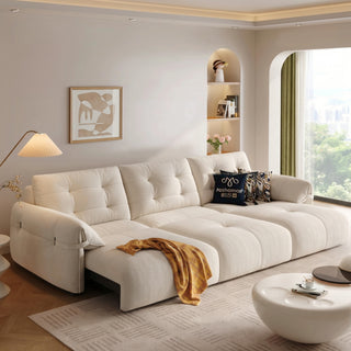 Cream cat-scratch fabric power sofa bed in a living room