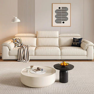 Cream cat-scratch fabric high-back sofa in a living room