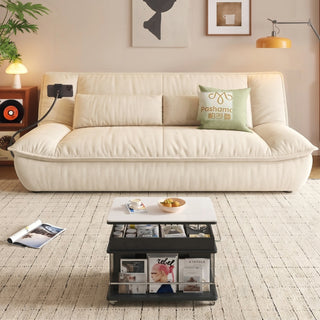 Cream cat-scratch sofa bed in a living room