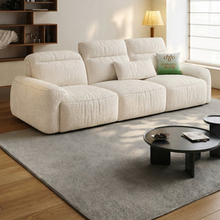 Cream lamb-fleece sofa in a living room