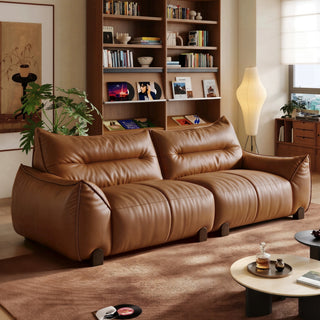 Tan leather sofa in a living room