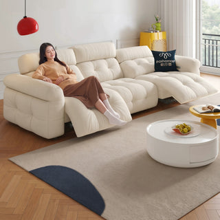 Cream chenille power recliner sofa in a living room