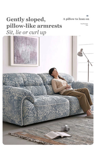 Gently sloped, pillow-like armrests