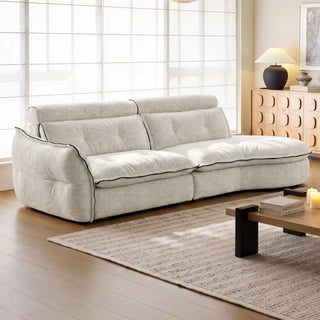 Light chenille curved sofa in a living room