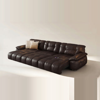 Amala Genuine Leather Sofa Bed in a living room