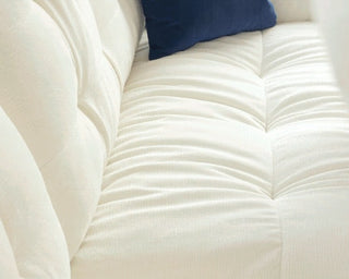 Plump tufted cushions