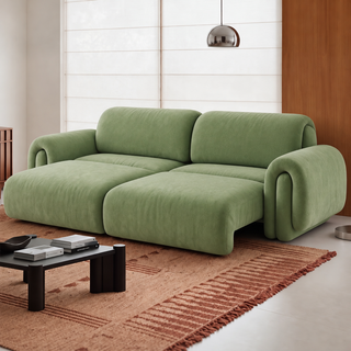 Power reclining fabric sofa in a living room