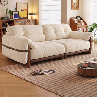 Cream fabric sofa with a wooden frame