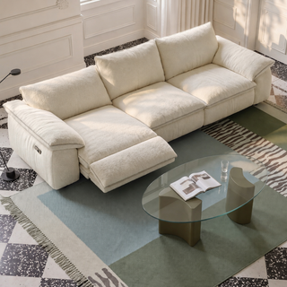 Cream fabric power sofa in a living room