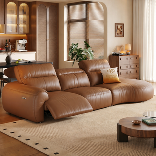 Tan leather power sofa in a living room