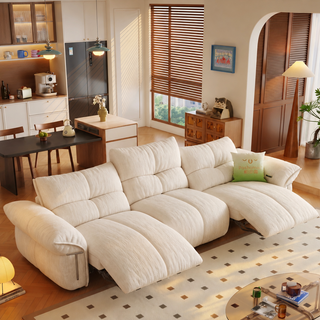 Cream fabric power sofa in a living room