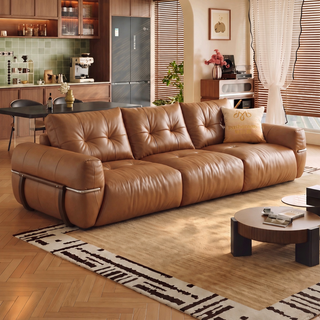 Tan oil-wax leather sofa in a living room