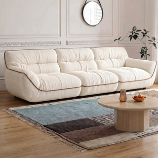 Cream fabric sofa in a living room