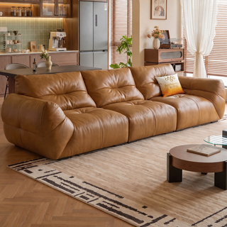 Tan oil-wax leather sofa in a living room