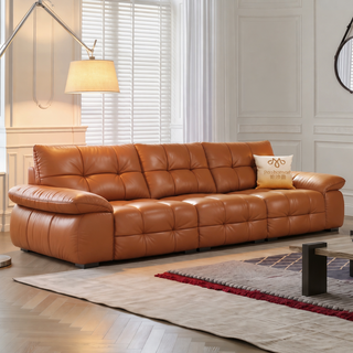 Tan leather sofa in a living room