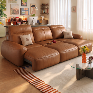 Tan leather power sofa in a living room