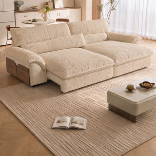 Cream lamb-fleece power sofa bed in a living room