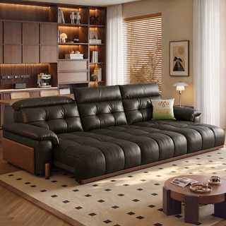 Black leather power sofa in a living room