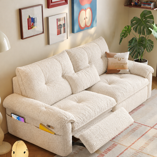 Cream power recliner sofa in a living room