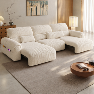 Cream power sofa bed in a living room
