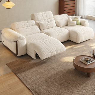 Cream lamb-fleece power sofa bed in a living room