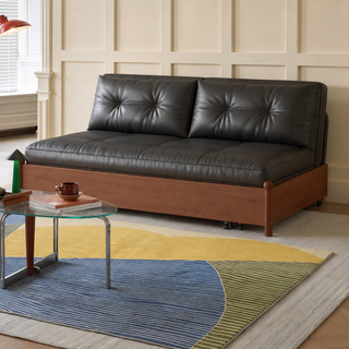 Black leather sofa bed on a wooden base