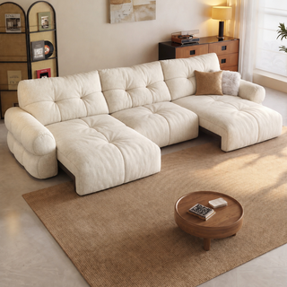 Cream cat-scratch velvet power sofa bed in a living room