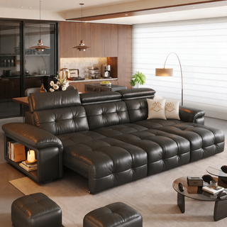 Black leather power sofa bed in a living room