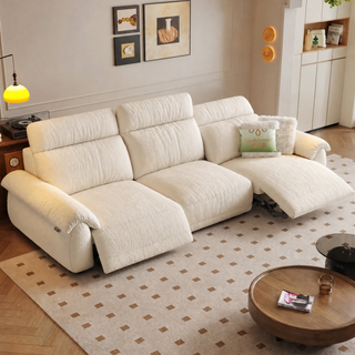 Cream chenille power recliner sofa in a living room