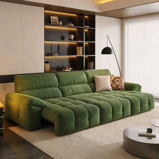 Green chenille power sofa bed in a living room