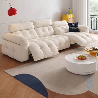 Cream cat-scratch fabric power recliner sofa in a living room