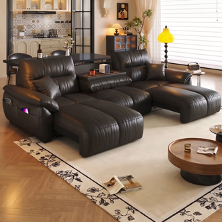 Dark brown leather power recliner sofa in a living room