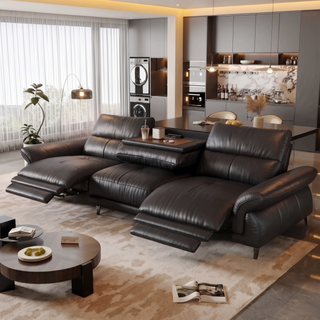 Black leather power recliner sofa in a living room